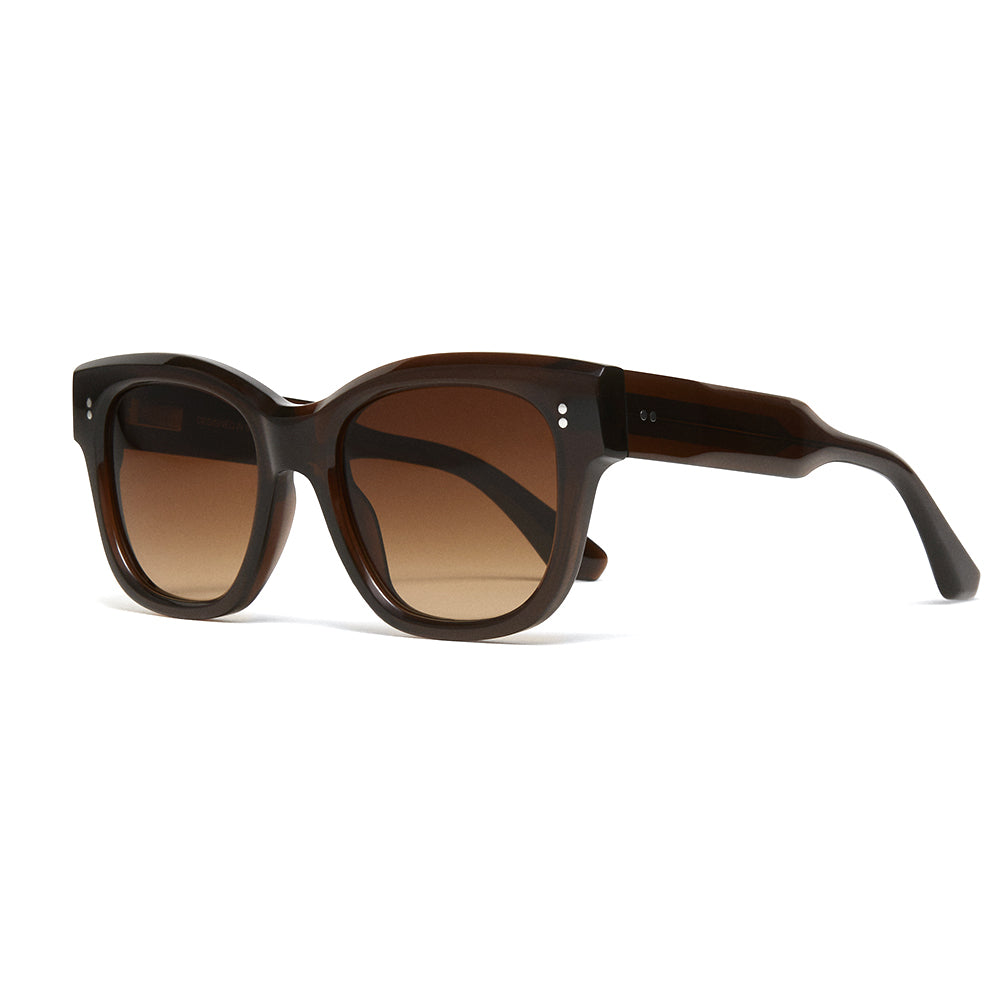 Oversized square sunglasses with a dark brown translucent acetate frame and matching gradient brown lenses, shown on a plain white background.