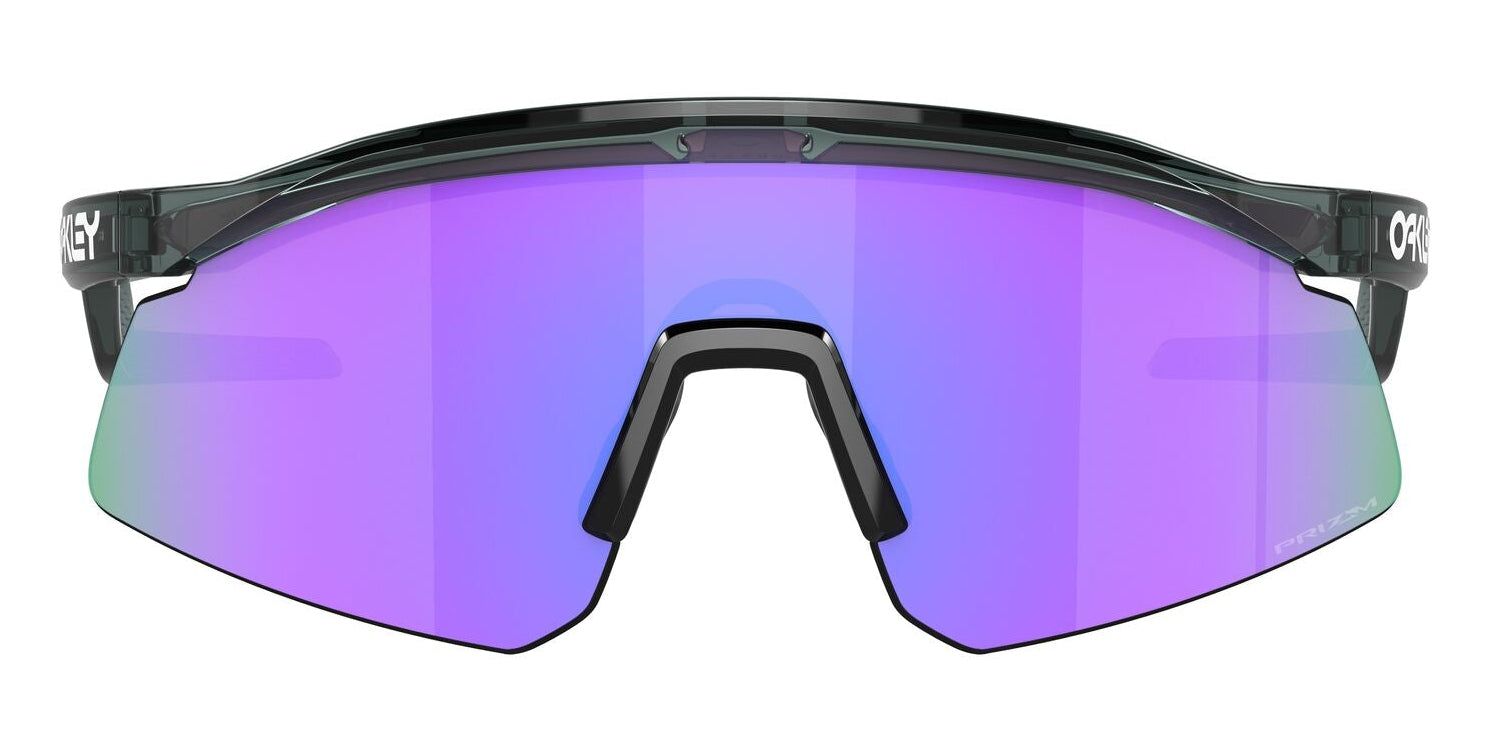 Sunglasses with purple lenses and black frame on a white background